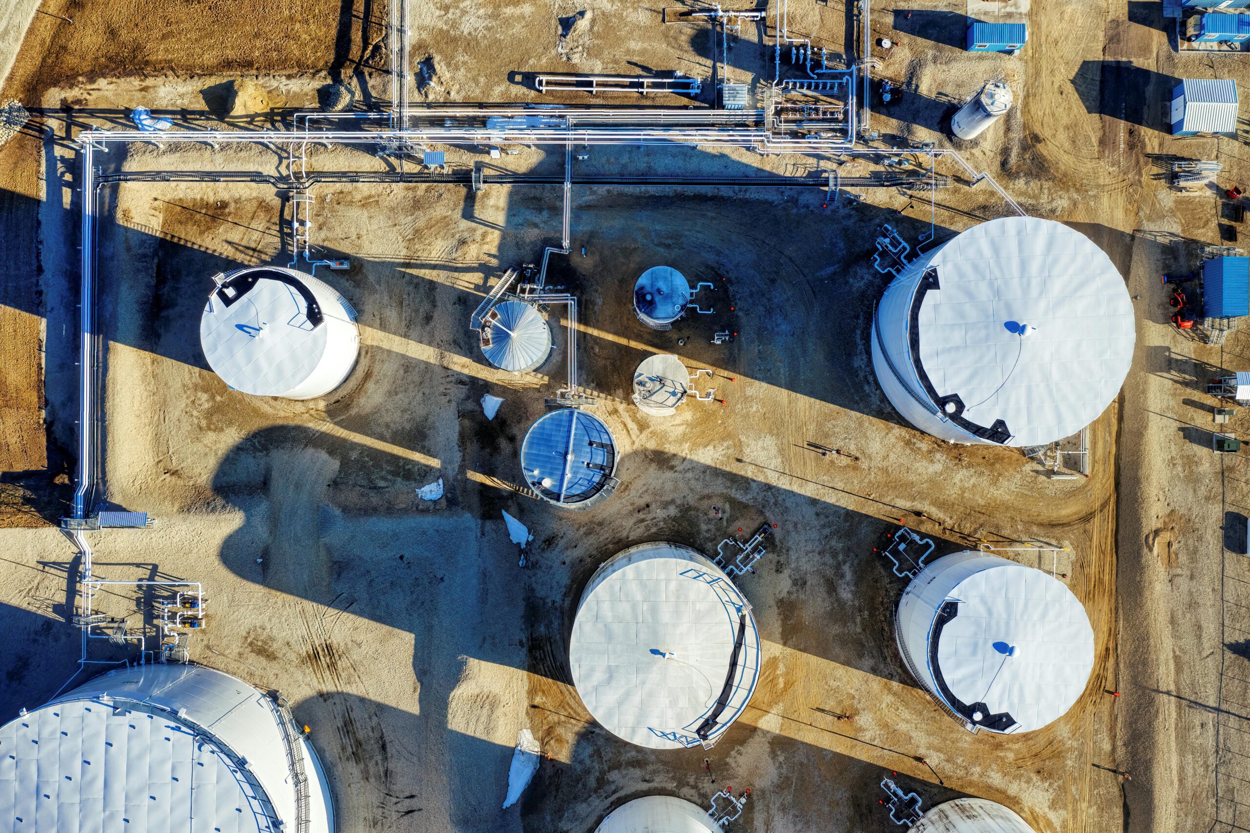 Top-down drone photograph of industrial silos and pipes in Eyota, Minnesota.