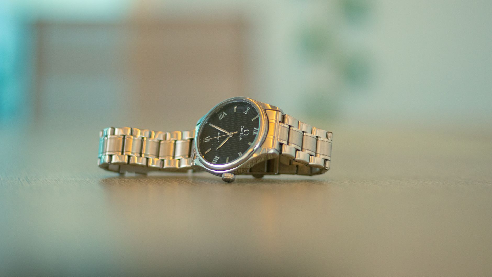 Elegant Omega wristwatch showcasing its sophisticated design in a close-up shot.