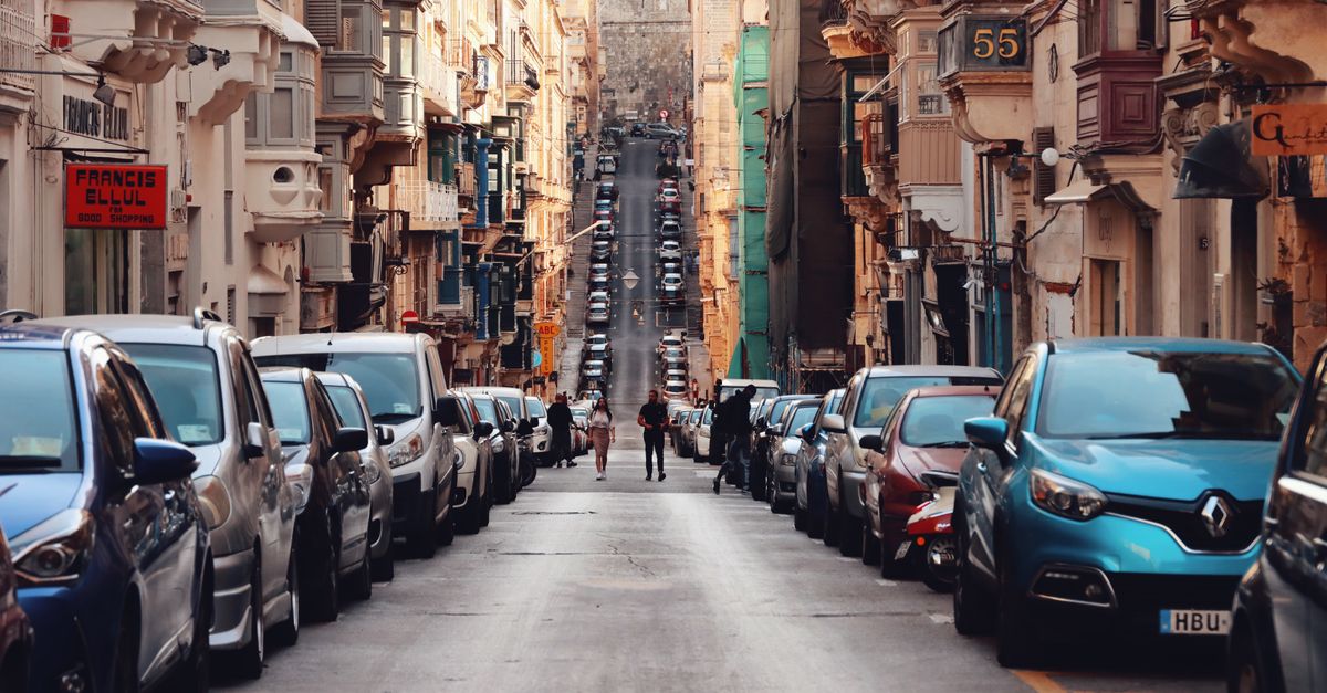 Captivating view of a bustling street in historic Valletta, Malta.
