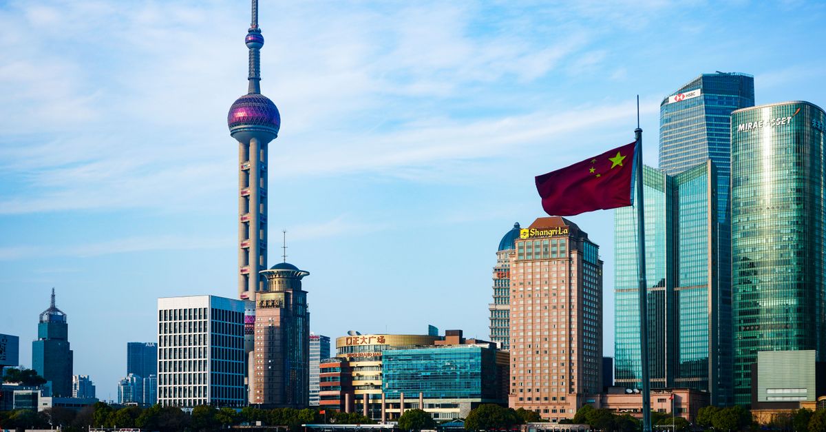 Stunning view of Shanghai's skyline featuring the iconic Oriental Pearl Tower and modern skyscrapers.