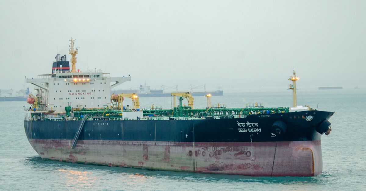 Large cargo ship 'Desh Gaurav' sailing in open sea, showcasing maritime transport.
