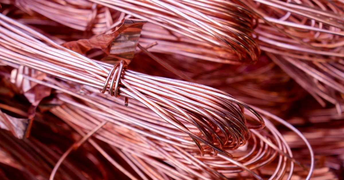 Detailed view of copper wires showcasing metallic texture and recycling theme.