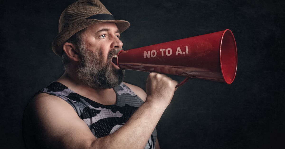Bearded man shouting through a red megaphone with 'No to A.I' message.