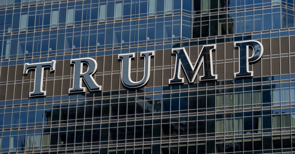Detailed facade view of the Trump building with reflective glass windows.