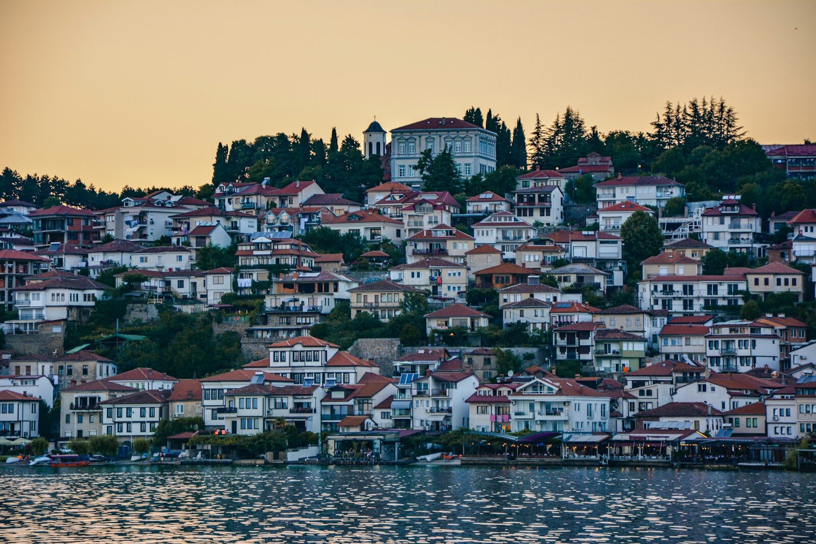 A large body of water with houses on top of it