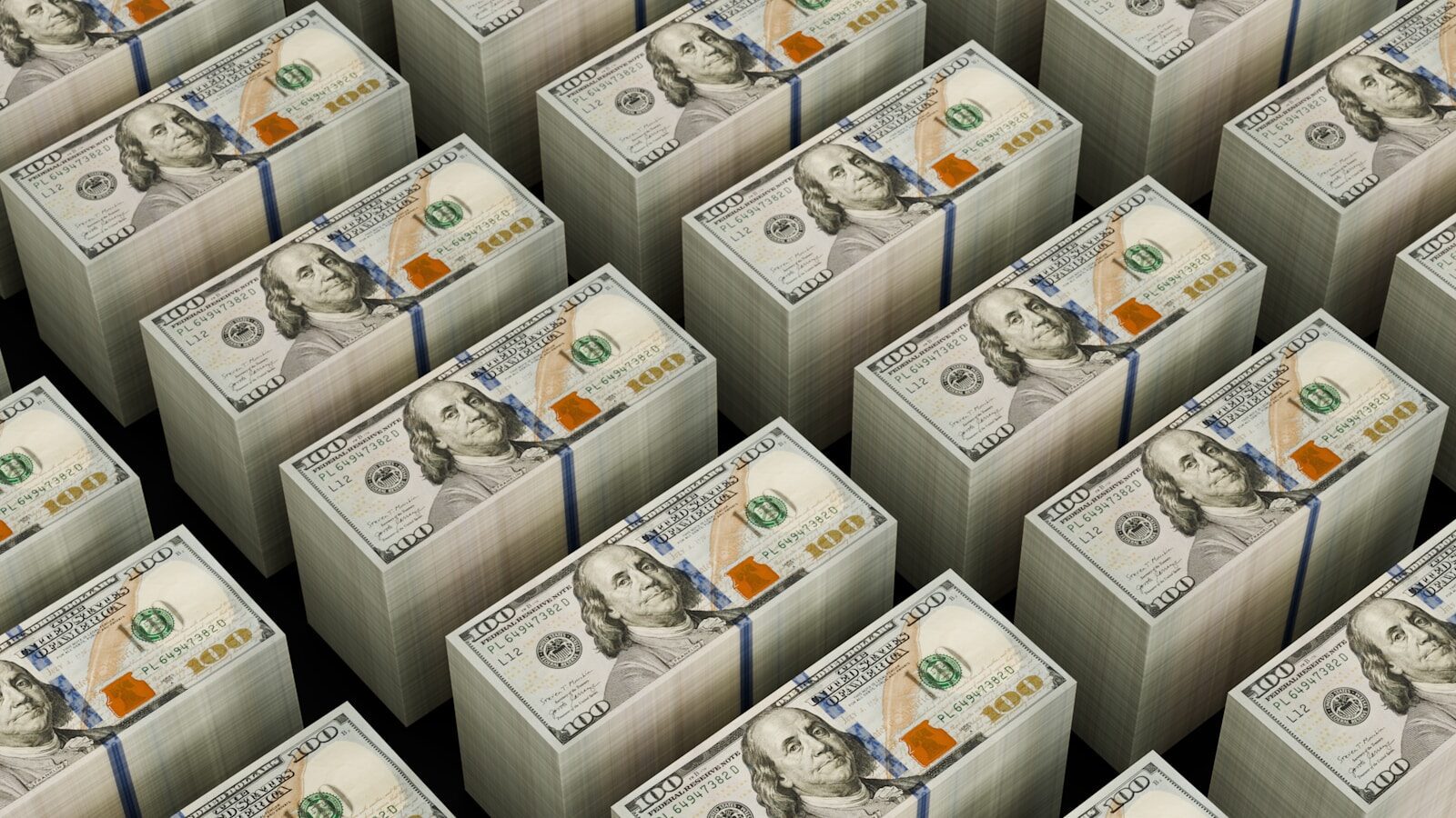 Stacks of hundred dollar bills are shown